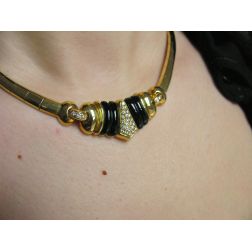 Photo of worn Yellow Gold segmented necklace with Onyx and pavé Diamonds