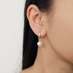 photo of worn Classic Hook Earrings 9mm Freshwater Pearl in Yellow Gold