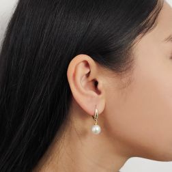photo of worn Classic Hook Earrings 9mm Freshwater Pearl in Yellow Gold