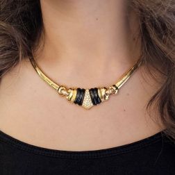Photo of worn Yellow Gold segmented necklace with Onyx and pavé Diamonds