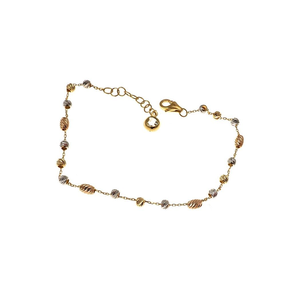 Three-tone gold chain bracelet with faceted beads and charms