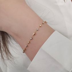 Bracciale a catena Sfere e Chicchi sfaccettati in Oro tre colori foto indossata