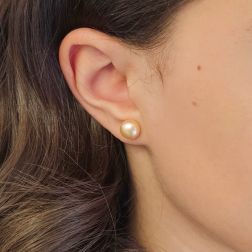 Photo of worn 8.80mm Freshwater Pink Button Pearl Stud Earrings in Yellow Gold