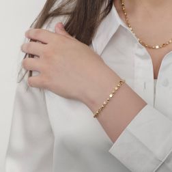 photo of worn Yellow Gold Bracelet with Cubes and Spheres