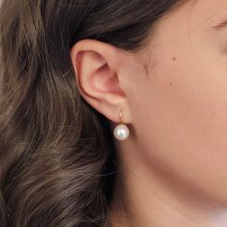 Photo of worn 9.5mm Akoya Pearl Classic Hook Earrings in Yellow Gold