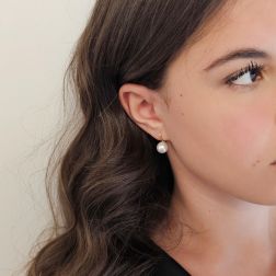 Photo of worn 9.5mm Akoya Pearl Classic Hook Earrings in Yellow Gold