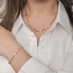 photo of worn Necklace with Cubes and Spheres in yellow gold