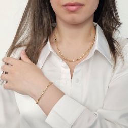 photo of worn Necklace with Cubes and Spheres in yellow gold