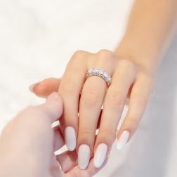 Photo of worn 5 Diamonds Center of 0.37ct and 4 of 0.30ct/031ct Ring Suspended