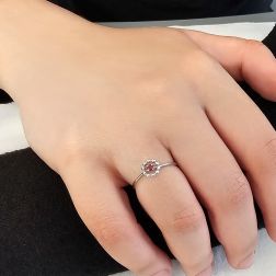 Photo of worn Easy Flower Ruby White Gold Solitaire Ring