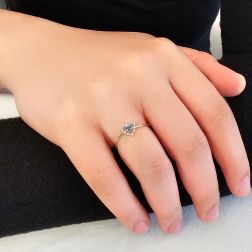 Photo of worn Easy Love Blue Sapphire White Gold Solitaire Ring