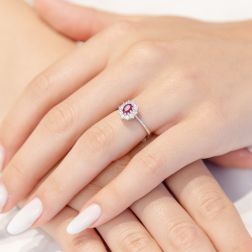 Photo of worn 5x4 Oval Ruby Kate Solitaire Ring with 10 Diamonds