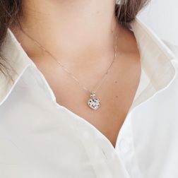 photo of worn Diamonds and Color Gems Pavè Rounded Heart Pendant