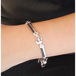 Bracciale in Oro Bianco e Caucciù a segmenti con Ancore foto indossata