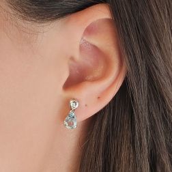 Photo of worn Aquamarine Drop Earrings with Diamond Accents