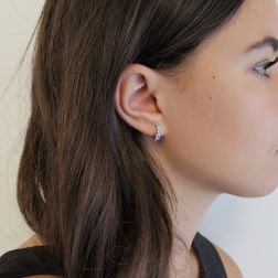 Photo of worn Trilogy Aquamarine and Diamond Hoops