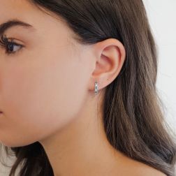Photo of worn Trilogy Blue Diamond and Diamond hoops