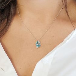 photo of worn White Gold Necklace with sky-blue enamelled Flower Pendant set with Diamonds