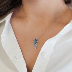 photo of worn White Gold Necklace with three sky-blue enamelled Flowers Pendant set with Diamonds