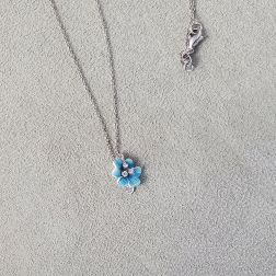White Gold Necklace with sky-blue enamelled Flower Pendant set with Diamonds