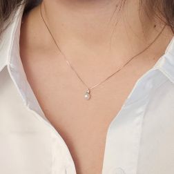 Photo of worn 5.5mm Akoya Pearl Necklace with a 0.027ct Diamond
