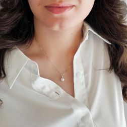 Photo of worn 7mm Akoya Pearl Necklace with a 0.041ct Diamond