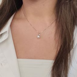 Photo of worn Akoya Pearl Necklace, 8–8.50 mm, with a 0.060 ct Diamond