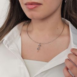 Photo of worn Blossom Wave Pendant with Diamonds