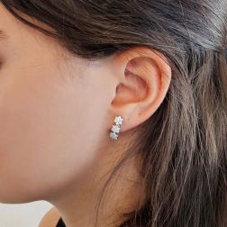 Photo of worn Trilogy Sparkling Flowers Earrings