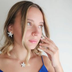 Photo of worn Starfish Earrings with Diamonds and Blue Sapphires 3cm
