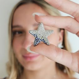 Photo of worn Diamonds and Blue Sapphires Sea Star Charm 3cm