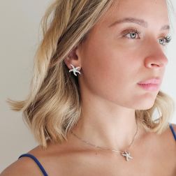 Starfish Earrings with Diamonds in White Gold photo of worn