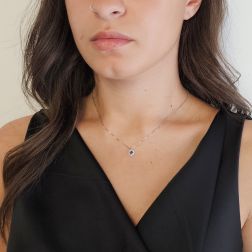 Photo of worn Veneta 0.7mm necklace with a Blue Sapphire light point set in White Gold – 7mm