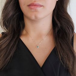 Photo of worn Veneta 0.7mm Necklace Emerald ‘Punto Luce’ Set in White Gold – 7mm
