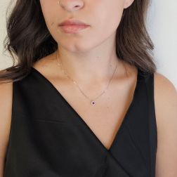 Photo of worn Light Point Ruby on Venetian Necklace Surrounded by White Gold - 7mm