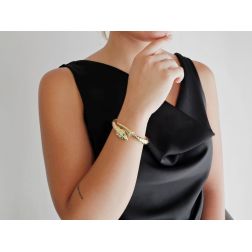 Photo of worn Rigid Snake Bangle bracelet with Emeralds