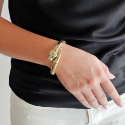 Photo of worn Rigid Snake Bangle bracelet with Emeralds