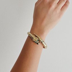 Photo of worn Rigid Snake Bangle bracelet with Emeralds