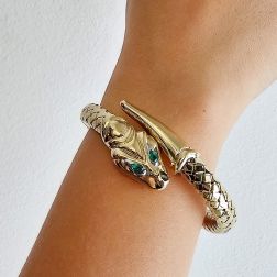 Photo of worn Rigid Snake Bangle bracelet with Emeralds