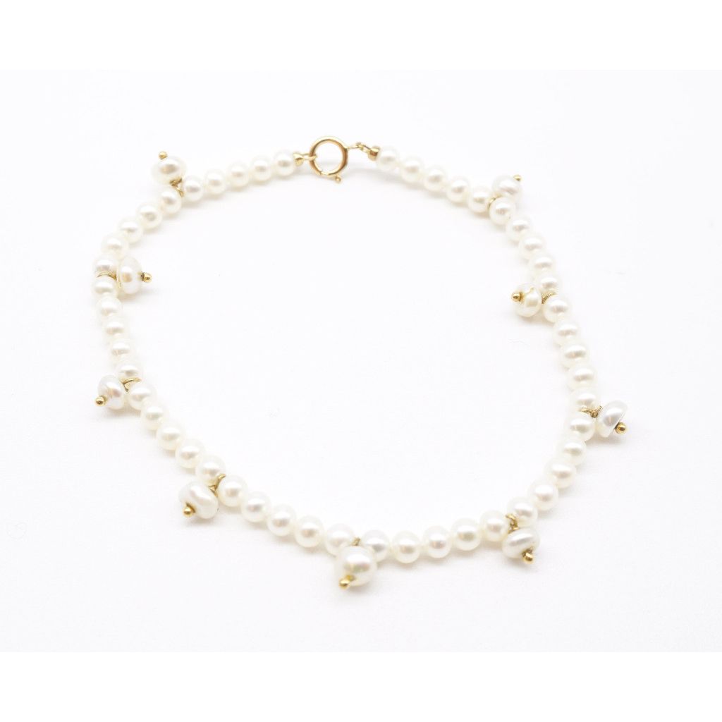 Bracciale charms di perle