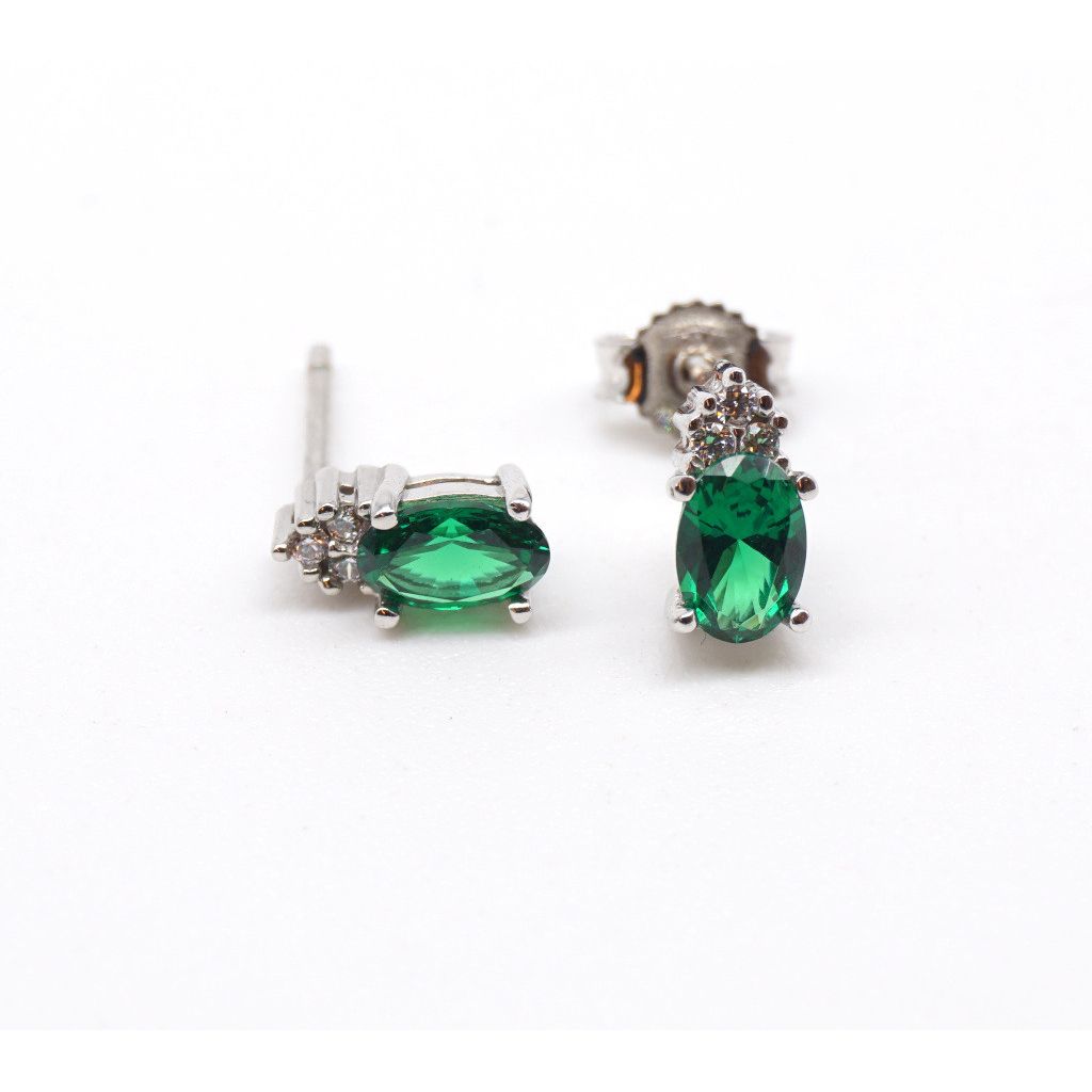 Green oval earrings and 3 zircons in White Gold
