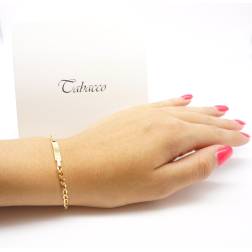 Photo of worn Baby 2.80mm flat oval chain bracelet with 3.90mm tag