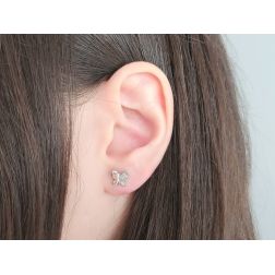 photo of worn Butterfly-shaped earrings Zircons and white gold