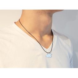 Photo of worn 18kt white gold divisible puzzle pendant