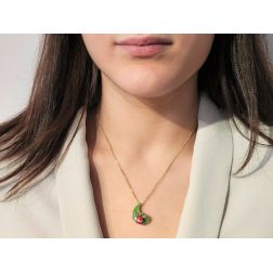 Photo of worn Gold Ladybug on Bronze Leaf Pendant