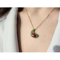 Photo of worn Gold Ladybug on Bronze Leaf Pendant