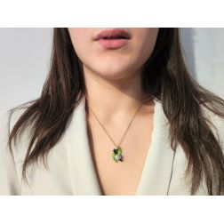 Photo of worn Gold Snail on Bronze Leaf Pendant