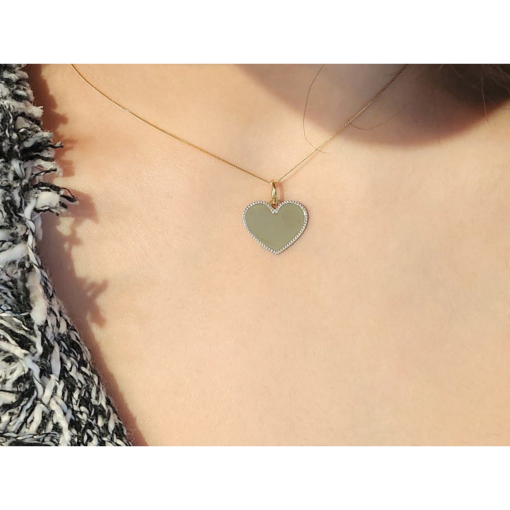 Choker vintage con ciondolo a forma di cuore dorato