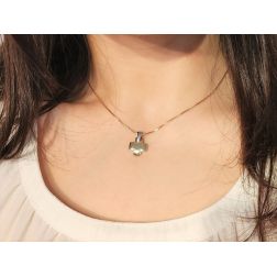 Photo of worn yellow gold short cross with white gold attachment